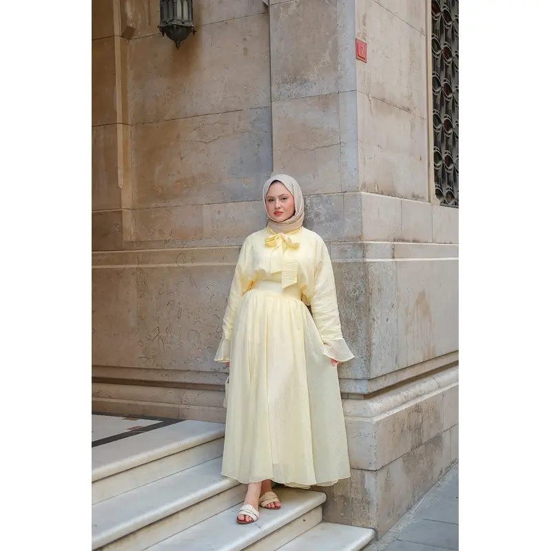 Yellow Two-Piece Set With Tulle Accents And Tie Details