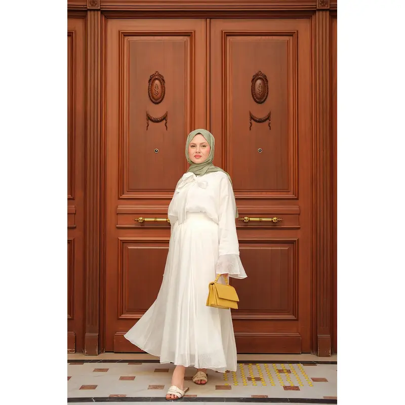 White Two-Piece Set With Tulle Accents And Tie Details